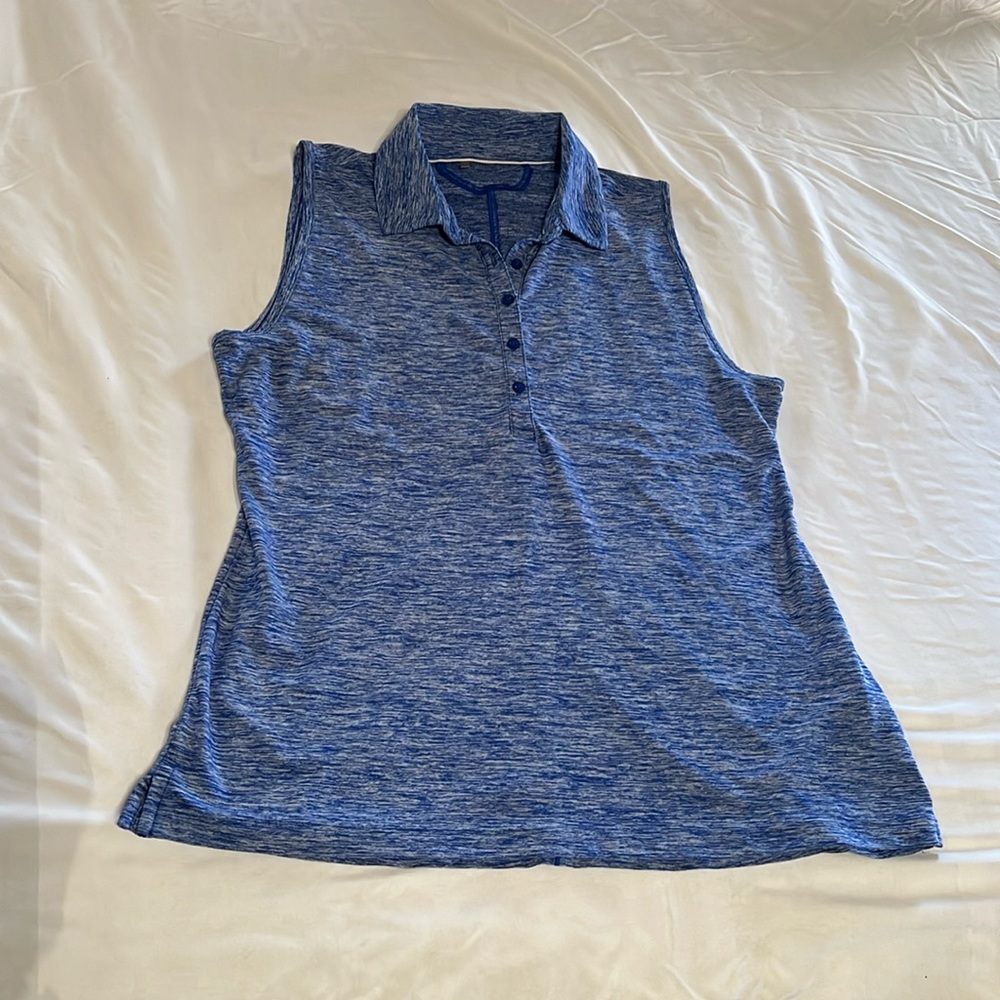 Women’s sleeveless golf shirt. Under armour  size large